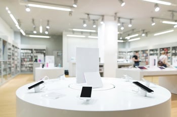 showcase-with-smartphones-in-the-modern-electronics-store-many-smartphones-on-the-shelf-of-the-technology-store_245974-2683